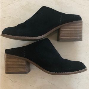 Tom’s black suede mules